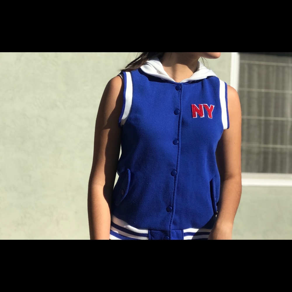 Sleeveless, button down, New York baseball jersey.